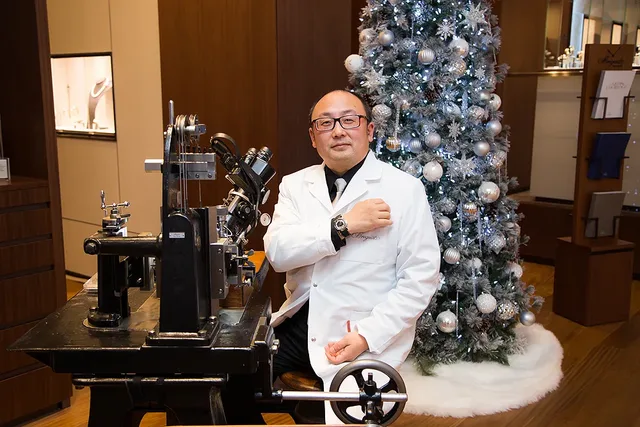 A Breguet watchmaker plies his trade