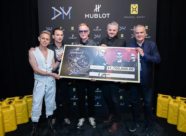 Depeche Mode and Ricardo Guadalupe - check to Scott Harrisson of charity water