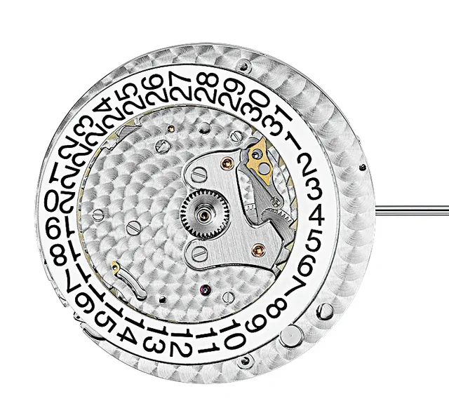 On the dial side, the date mechanism, with instantaneous date advancement, can be seen.