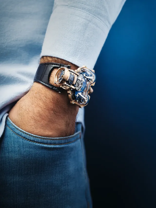 MBandF_HM9_SV_RG_Blue_Wristshot_HRES_CMYK