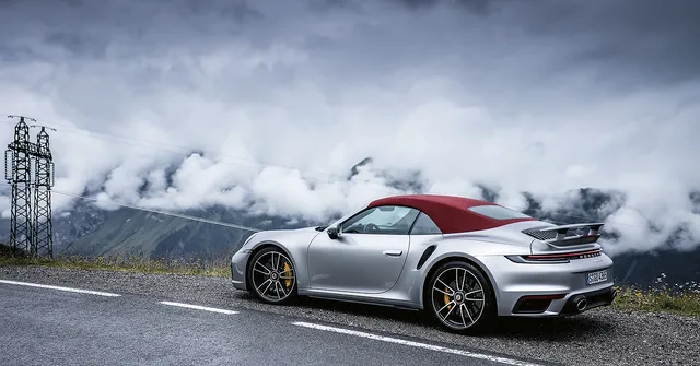 Porsche_911_road_clouds_1000