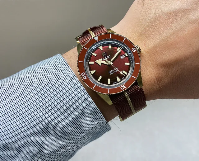 Rado-CaptainCook_Burgundy-Bronze_wrist_1000