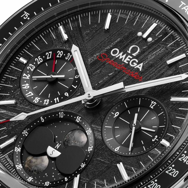 9.-OMEGA_SpeedmasterMoonphaseMeteorite_304.30.43.52.01.001