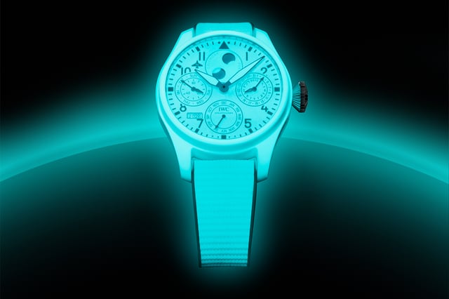 IWC, complication watch with luminous material on the dial, in the case, and on the strap