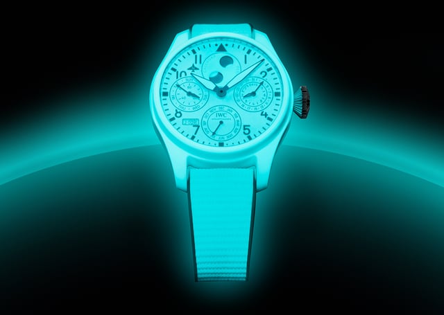 IWC, complication watch with luminous material on the dial, in the case, and on the strap