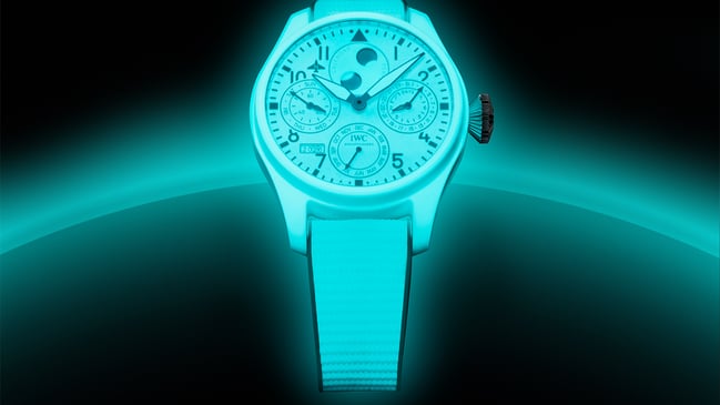 IWC, complication watch with luminous material on the dial, in the case, and on the strap