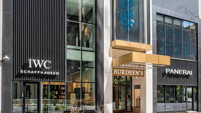 Exterior of Burdeen’s Jewelry on East Oak Street in Chicago, flanked by IWC Schaffhausen and Panerai boutiques.