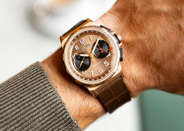 Angelus-Son-Chronodate-Gold-and-Titanium-Moka-Editions-Wrist.jpg