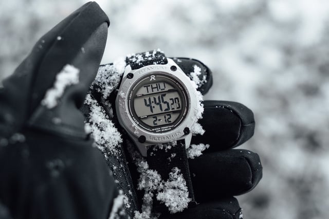 RZE UTD-8080 digital watch worn over a black glove