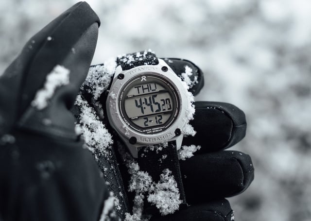 RZE UTD-8080 digital watch worn over a black glove