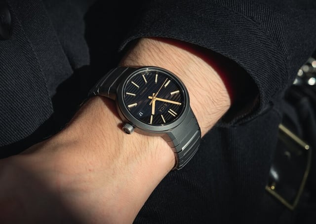 Leica ZM 11 Titanium Launch Edition wrist shot showing cushion-shaped case and layered dial.